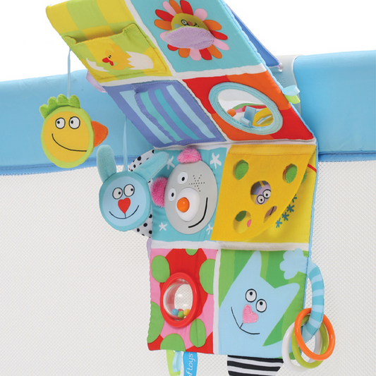 Taf Toys Centro de juegos para cuna con música y luces