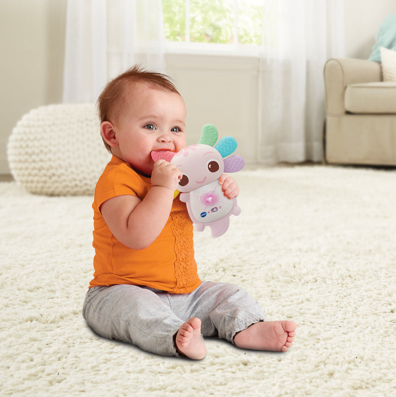 VTech Mordedor musical para axolote Rainbow Colours com guelras de silicone rosa.