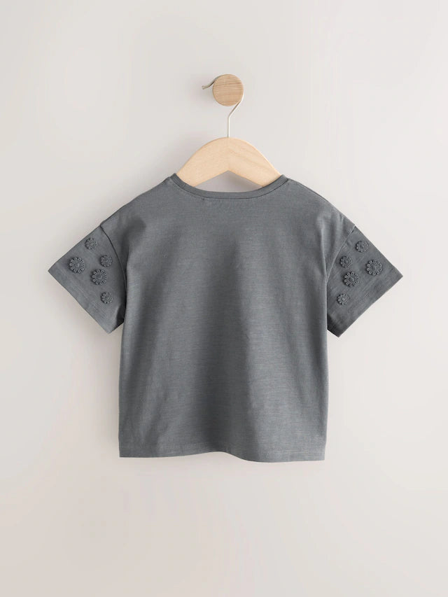 |Girl| Camiseta 100% Algodão De Manga Curta Cinza Carvão Daisy (3 meses a 7 anos)