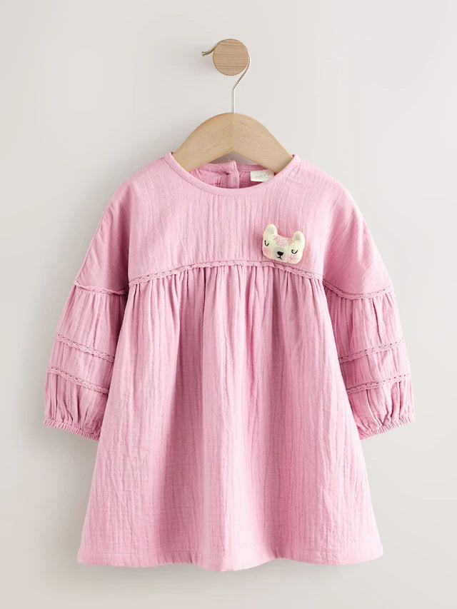 |Girl| Vestido Texturizado Rosa Com Personagem (3 meses a 8 anos)