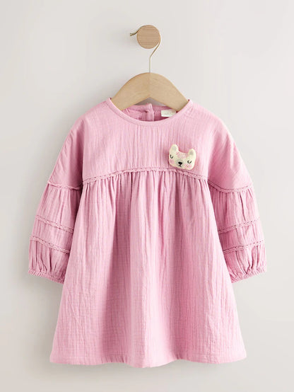 |Girl| Vestido Texturizado Rosa Com Personagem (3 meses a 8 anos)