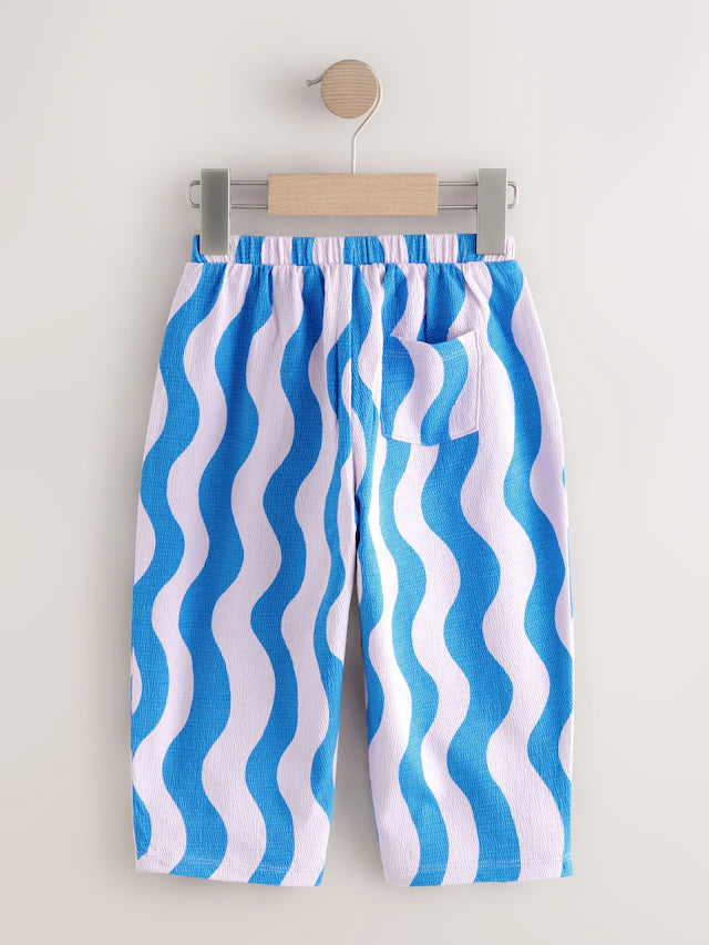 |Girl| Calça Cano Alto Texturizada Com Listras Onduladas Azul/Lilás (3 meses a 7 anos)