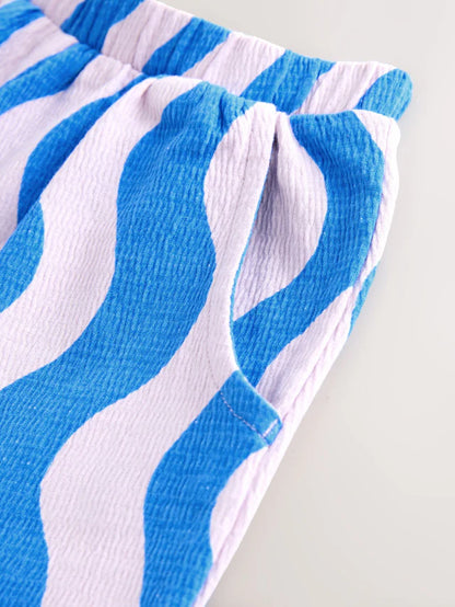 |Girl| Calça Cano Alto Texturizada Com Listras Onduladas Azul/Lilás (3 meses a 7 anos)