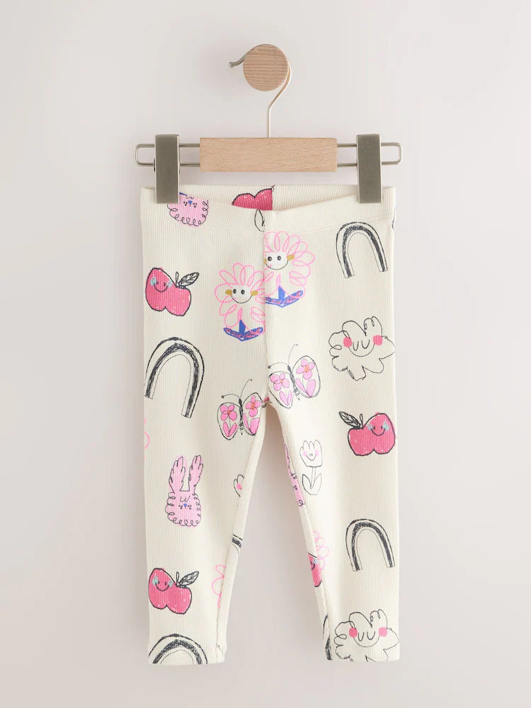 |Girl| Leggings Caneladas Com Rabiscos Brancos Crus (3 meses a 7 anos)