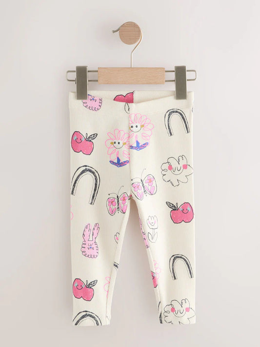 |Girl| Leggings Caneladas Com Rabiscos Brancos Crus (3 meses a 7 anos)