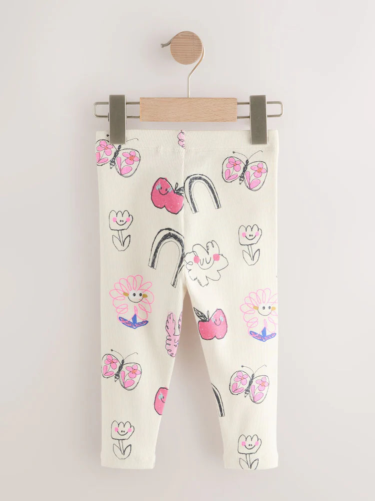 |Girl| Leggings Caneladas Com Rabiscos Brancos Crus (3 meses a 7 anos)