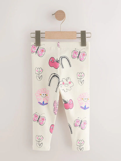 |Girl| Leggings Caneladas Com Rabiscos Brancos Crus (3 meses a 7 anos)