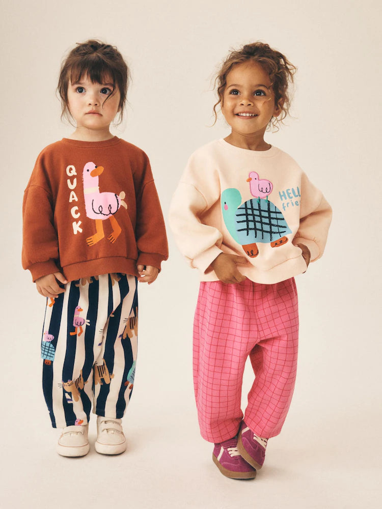 |Girl| Conjunto De 2 Peças: Moletom Com Estampa De Pato e Calça Modelo "Barrel" (Rosa/Cru) – (3 meses a 7 anos)