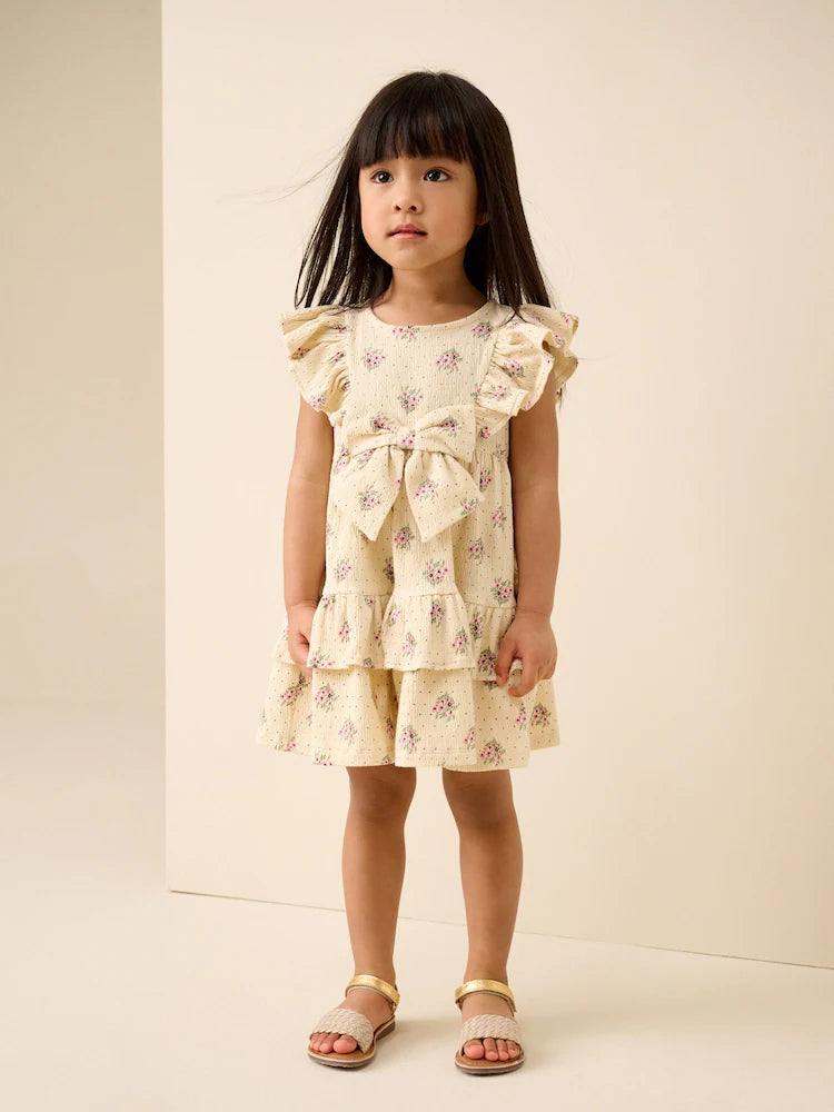 |Girl| Vestido De Verão Cor Creme Sem Mangas Com Detalhe De Laço e Babados (3 meses a 7 anos)