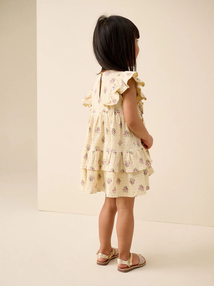|Girl| Vestido De Verão Cor Creme Sem Mangas Com Detalhe De Laço e Babados (3 meses a 7 anos)