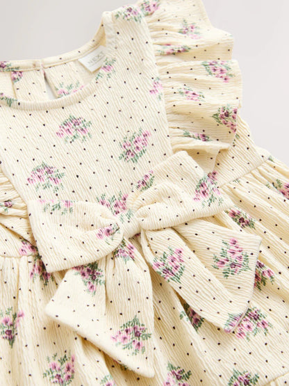 |Girl| Vestido De Verão Cor Creme Sem Mangas Com Detalhe De Laço e Babados (3 meses a 7 anos)