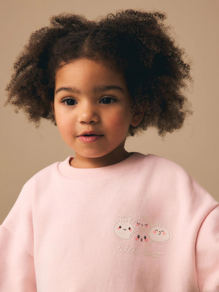 |Girl| Moletom Rosa Claro Com Estampa De Pãezinhos Bao (3 meses a 7 anos)