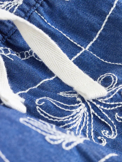 |Boy| Conjunto De Camisa e Shorts De Manga Curta Com Gola Redonda e Bordado De Vida Marinha em jeans azul.