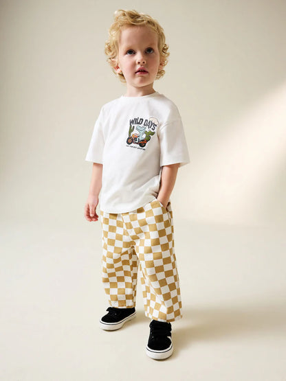 |Boy| Calças Largas Com Estampa Xadrez Amarela e Branca (3 meses a 7 anos)