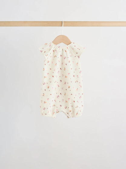 |BabyGirl| Conjunto De 4 Macacões De Bebê Em Malha Jersey Com Estampa Floral Neutra.