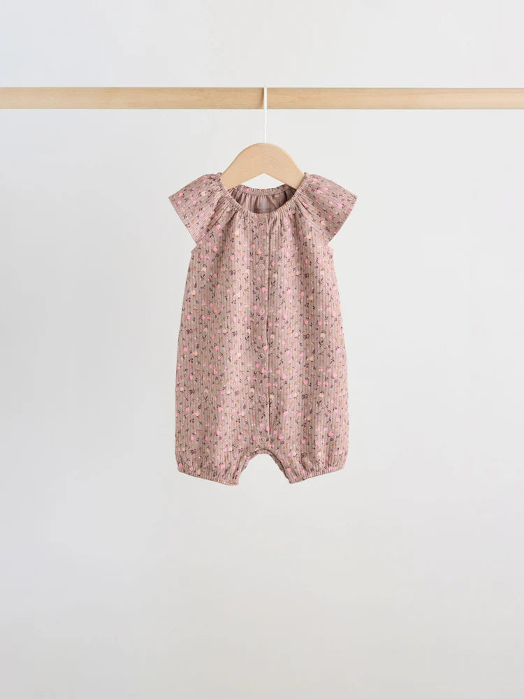 |BabyGirl| Conjunto De 4 Macacões De Bebê Em Malha Jersey Com Estampa Floral Neutra.