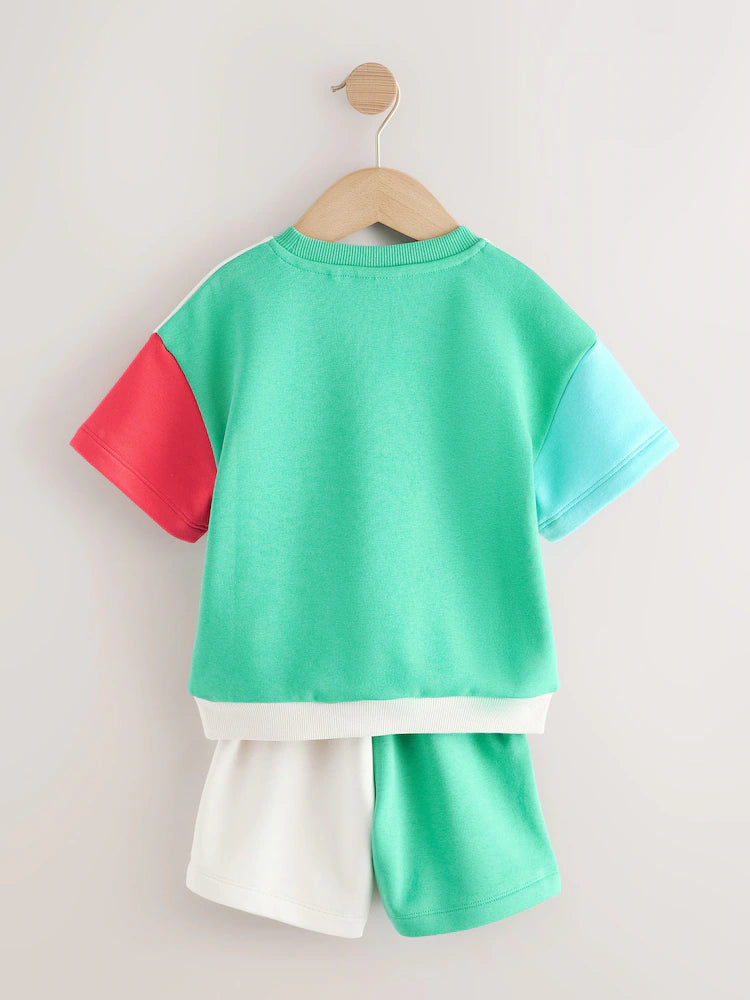 |Boy| Conjunto Mickey De Manga Curta e Shorts Em Blocos De Cores (3 meses a 8 anos)