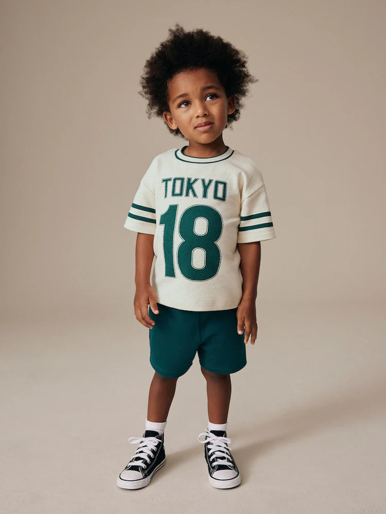 |Boy| Camiseta Universitária Creme De Manga Curta Com Estampa (3 meses a 7 anos)