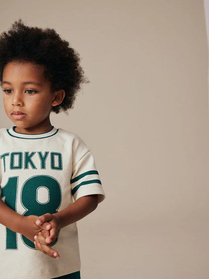 |Boy| Camiseta Universitária Creme De Manga Curta Com Estampa (3 meses a 7 anos)