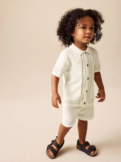 |Boy| Conjunto De Camisa Polo e Shorts Em Tricô Texturizado Cor Cru Com Botões Frontais (3 meses a 10 anos)