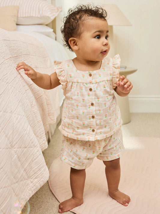 |BabyGirl| Conjunto De 2 Peças Para Bebê, Composto Por Top e Shorts Em Tecido Texturizado Rosa e Bege Com Estampa Floral (0 meses a 2 anos)