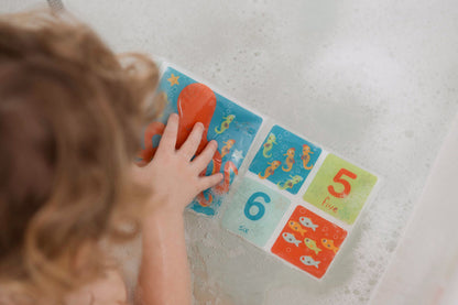 Nuby Livro de Banho Macio e resistente Com som de surpresa