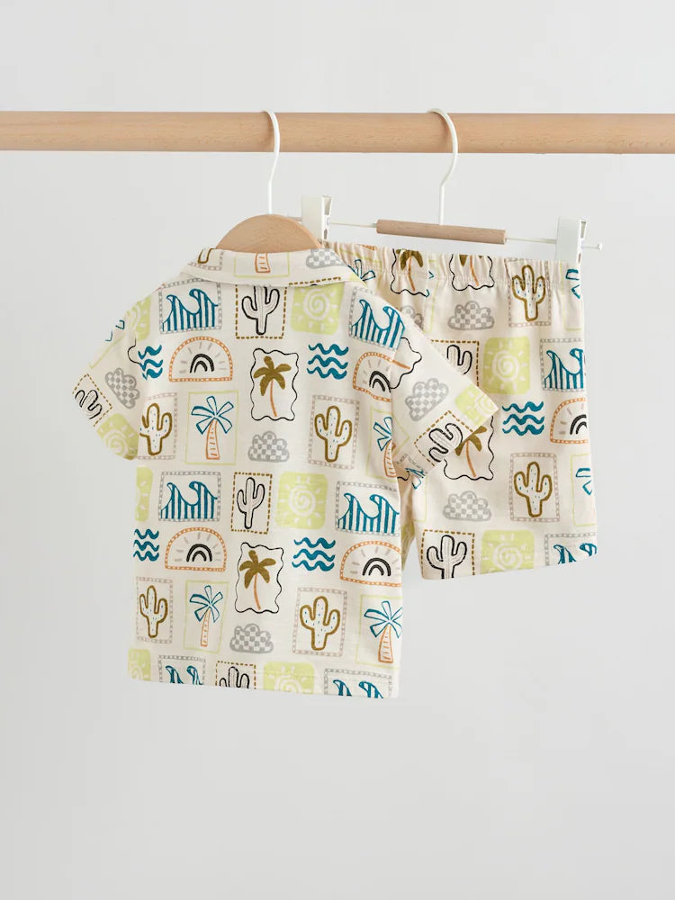 |BabyBoy| Conjunto Infantil De Camiseta e Shorts Com Estampa Neutra De Palmeiras (0 meses a 2 anos)