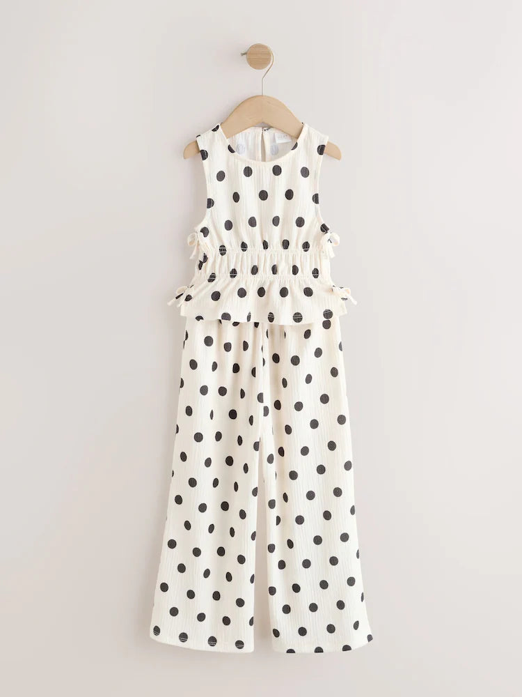 |BigGirl| Conjunto de blusa de poá e calça wide leg (3 a 16 anos)