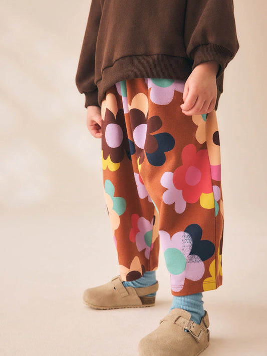 |Girl| Calça Marrom com Estampa Floral e Modelagem Barrel (3 meses a 7 anos)