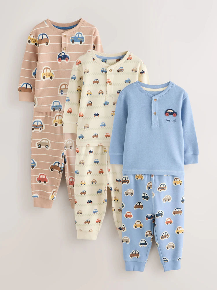 |Boy| Kit com 3 Pijamas "Transport" (Cru/Azul/Bege) – Modelo Snuggle (9 meses a 8 anos)
