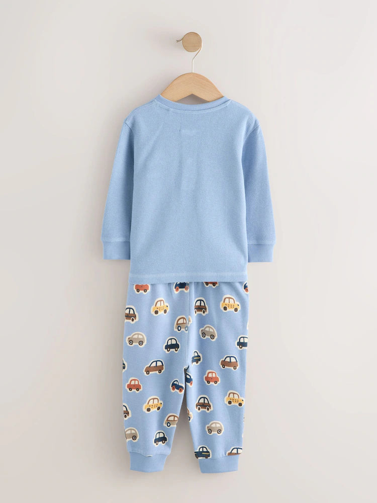 |Boy| Kit com 3 Pijamas "Transport" (Cru/Azul/Bege) – Modelo Snuggle (9 meses a 8 anos)