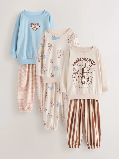 |Girl| Kit Com 3 Pijamas Estilo Jogger Com Estampa De Esqui Em Tons Neutros (9 meses a 12 anos)
