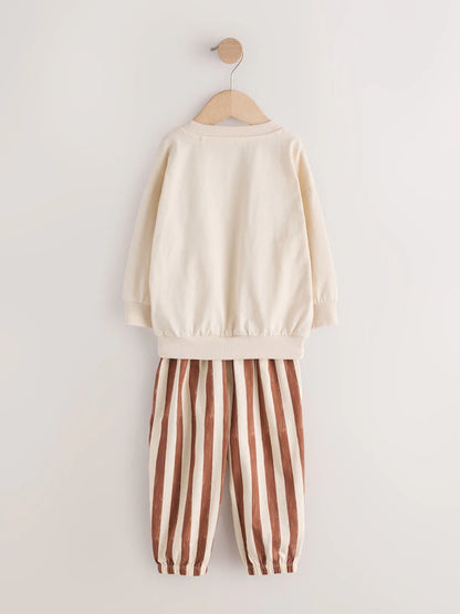 |Girl| Kit Com 3 Pijamas Estilo Jogger Com Estampa De Esqui Em Tons Neutros (9 meses a 12 anos)
