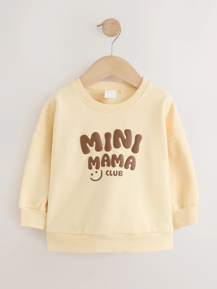 |Girl| Moletom Gola Careca "Mini Mama" Amarelo-Manteiga (3 meses a 7 anos)