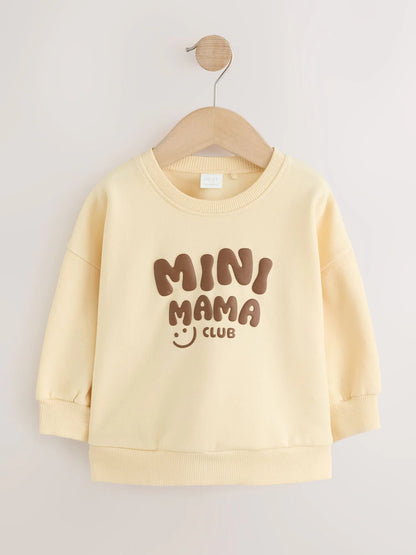 |Girl| Moletom Gola Careca "Mini Mama" Amarelo-Manteiga (3 meses a 7 anos)