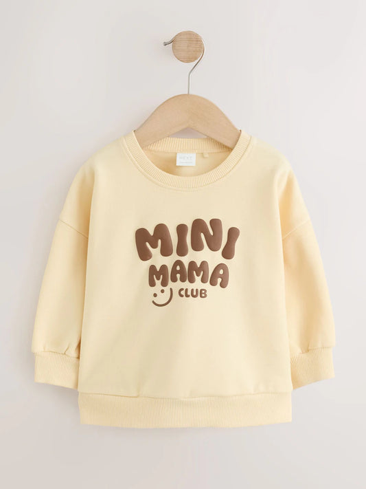 |Girl| Moletom Gola Careca "Mini Mama" Amarelo-Manteiga (3 meses a 7 anos)