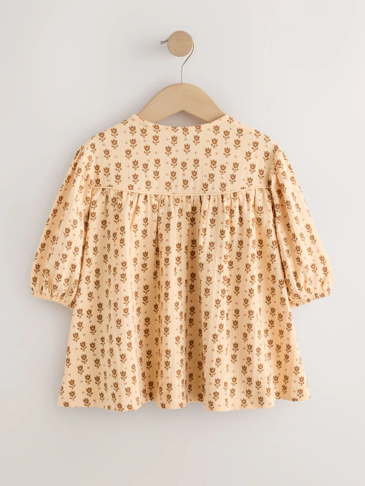 |Girl| Vestido Floral em Tons Neutros com Mangas Longas Bufantes (3 meses a 7 anos)