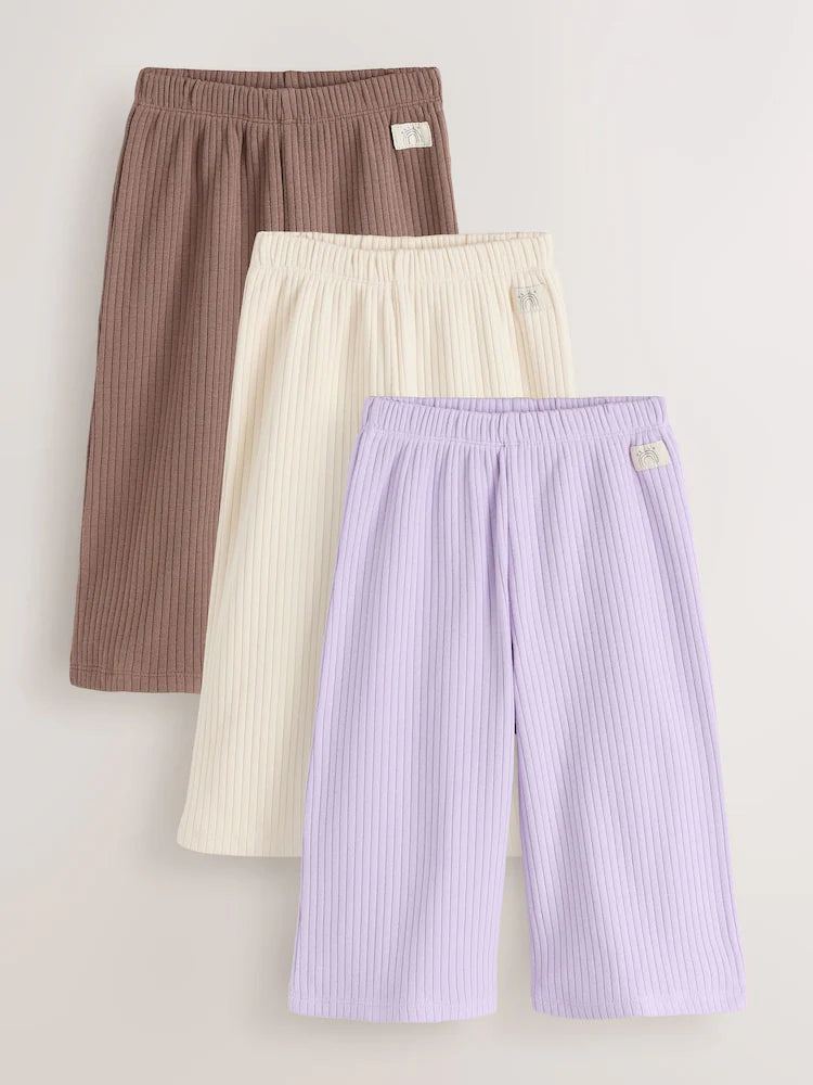 |Girl| Kit com 3 Calças Caneladas Wide Leg (Neutro/Lilás) – 3 meses a 7 anos