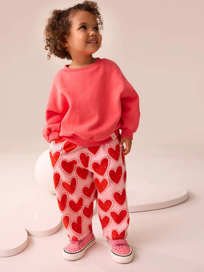 |Girl| Calças Caneladas Com Textura De Coração Vermelho (3 meses a 7 anos)