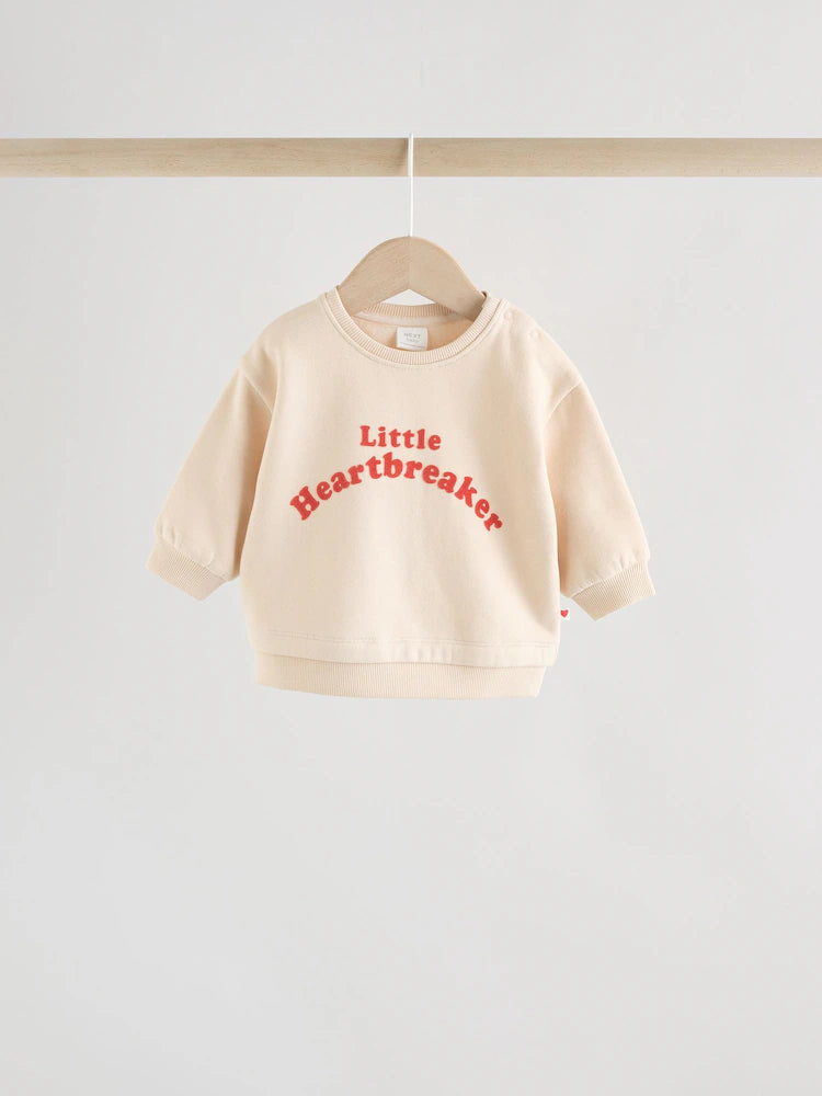 |BabyGirl| Conjunto Para Bebê Com Blusa De Moletom e Leggings "Heartbreaker" Em Tons Neutros/vermelhos (0 meses a 2 anos)