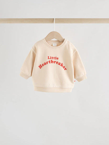 |BabyGirl| Conjunto Para Bebê Com Blusa De Moletom e Leggings "Heartbreaker" Em Tons Neutros/vermelhos (0 meses a 2 anos)