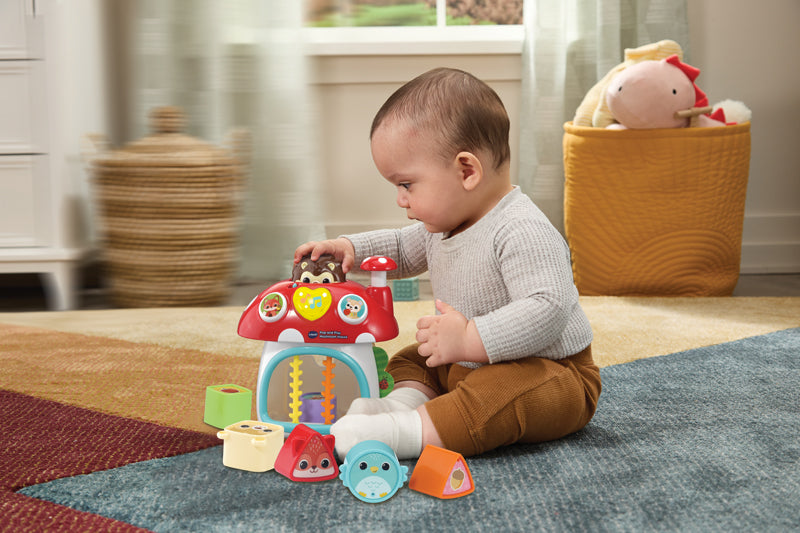 VTech Casinha de cogumelo Pop and Play com ouriço-cacheiro para brincar de esconde-esconde em uma floresta encantadora.