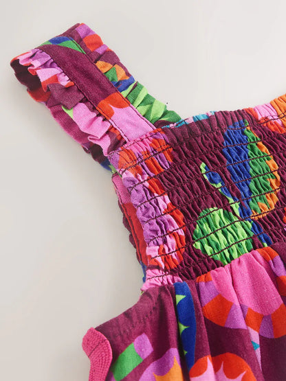 |Girl| Macacão Curto Estampado Em Tons De Roxo e Vermelho (3 meses a 7 anos)