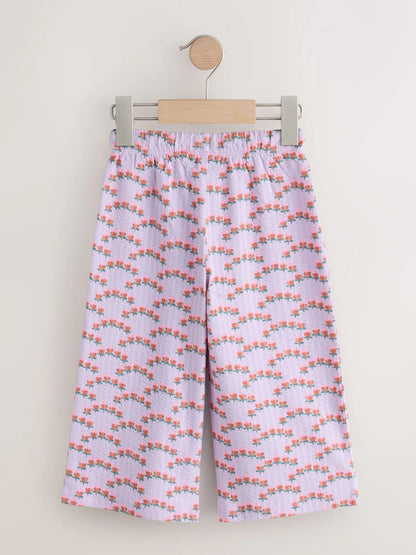 |Girl| Calças Largas Texturizadas Com Estampa Floral Miúda Roxa (3 meses a 7 anos)