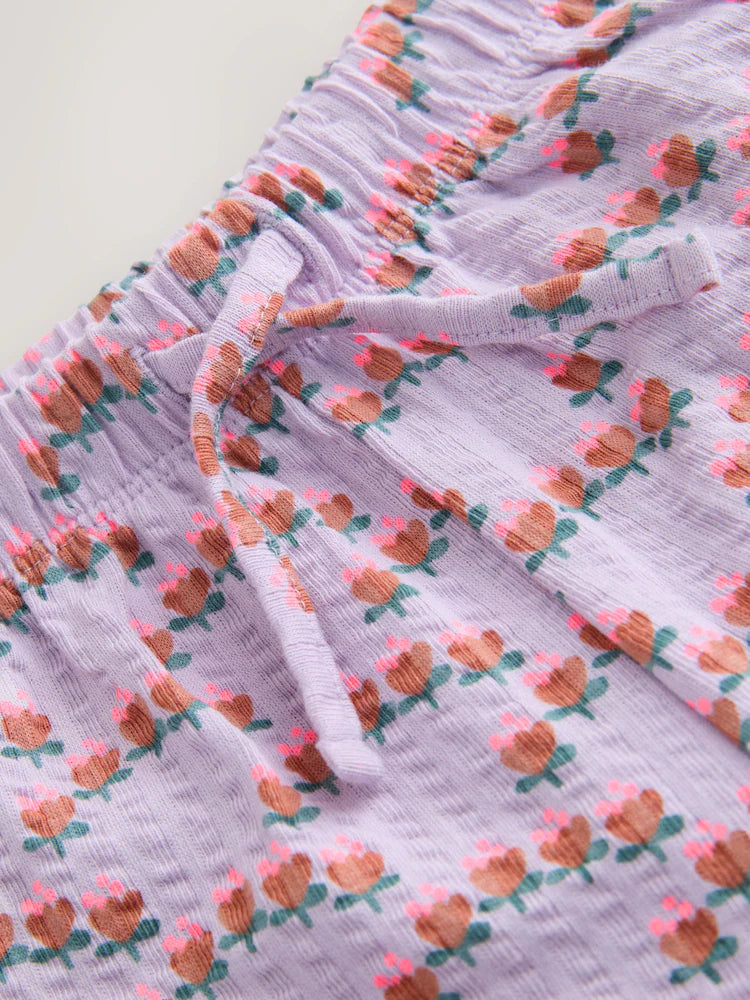 |Girl| Calças Largas Texturizadas Com Estampa Floral Miúda Roxa (3 meses a 7 anos)