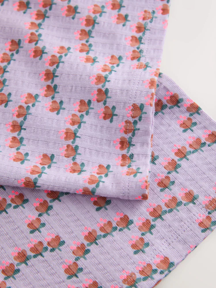 |Girl| Calças Largas Texturizadas Com Estampa Floral Miúda Roxa (3 meses a 7 anos)