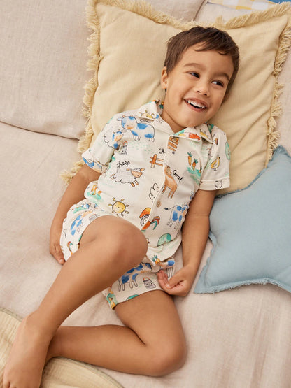|Boy| Pijama Curto Com Estampa De Fazenda Em Tons De Bege/Amarelo/Azul/Verde Com Um Botão Frontal (9 meses-