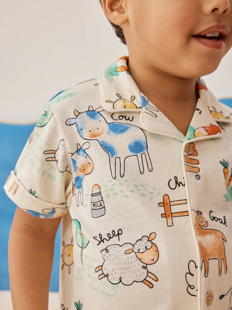 |Boy| Pijama Curto Com Estampa De Fazenda Em Tons De Bege/Amarelo/Azul/Verde Com Um Botão Frontal (9 meses-