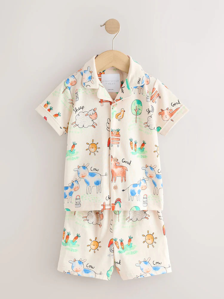 |Boy| Pijama Curto Com Estampa De Fazenda Em Tons De Bege/Amarelo/Azul/Verde Com Um Botão Frontal (9 meses-