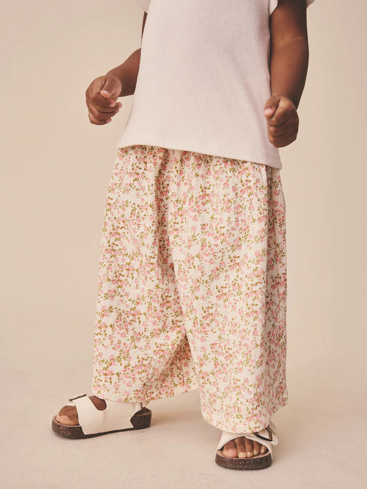 |Girl| Calças De Perna Larga Com Estampa Floral Miúda Em Tons De Bege e Branco (3 meses a 7 anos)